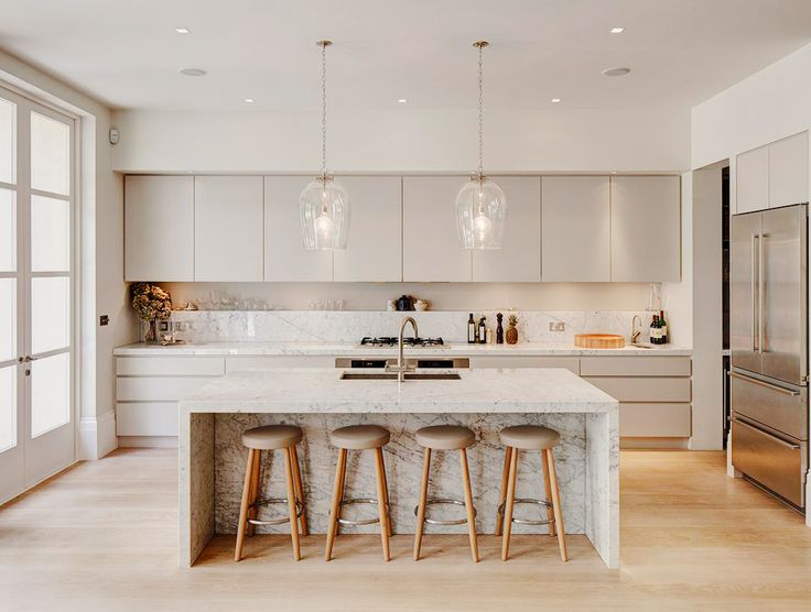 white-kitchen-with-marble-countertops